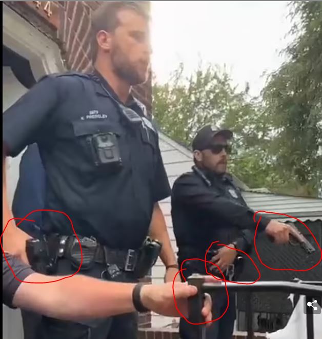 Detroit police draw guns to control crowd after the illegally arrest black man